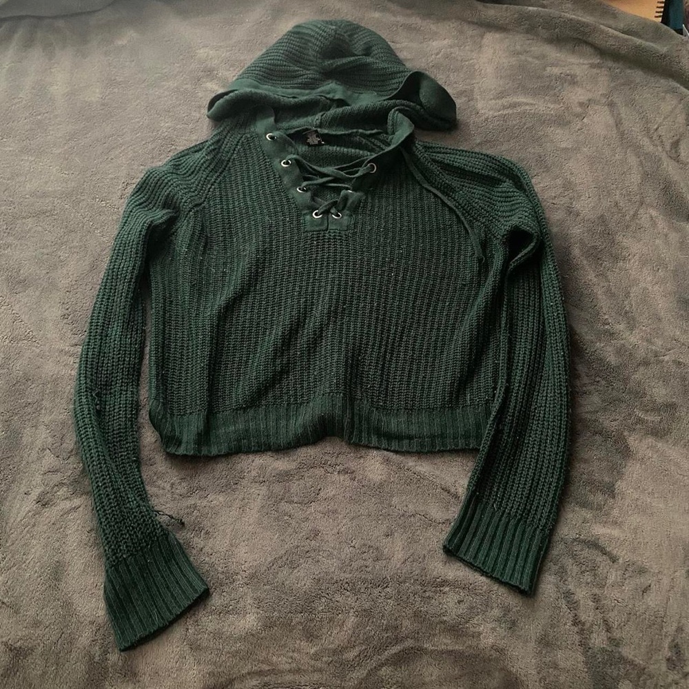 Dark green knitted sweater with hood